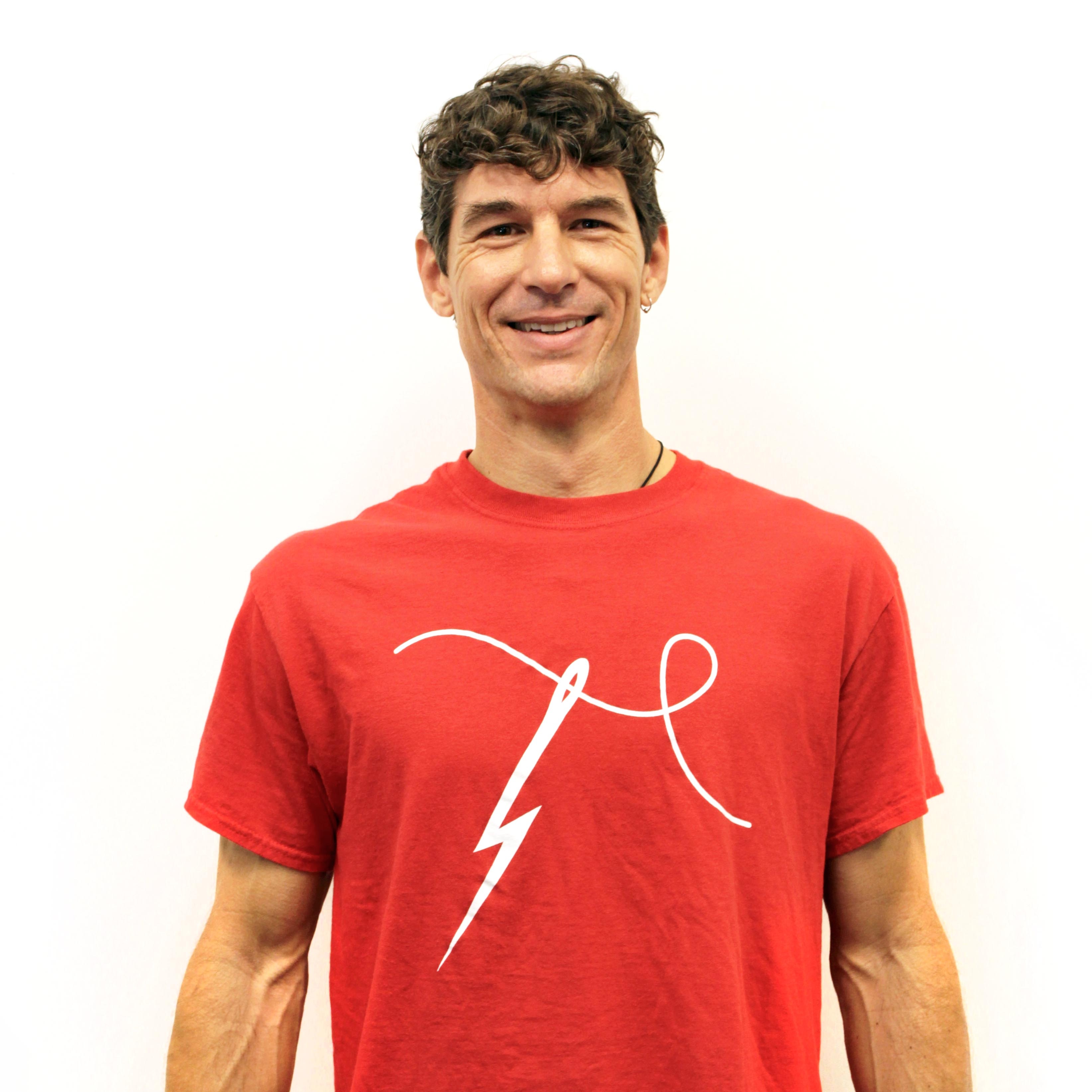 Man Sewing Red T-Shirt - Small
