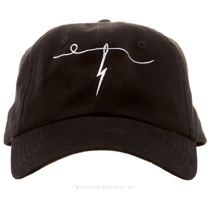 Man Sewing Baseball Brushed Twill Cap - Black Cap with White Needle Logo